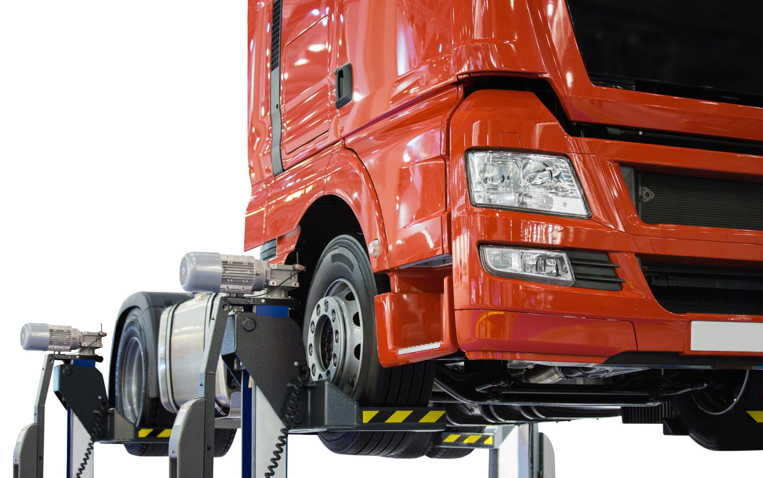 Truck on a lift in a car service. Isolated on white background